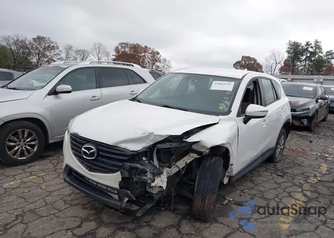 2016 Mazda Cx-5 Sport from USA, damaged, VIN JM3KE2BY5G0668967